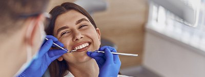 Woman smiling during dental checkup